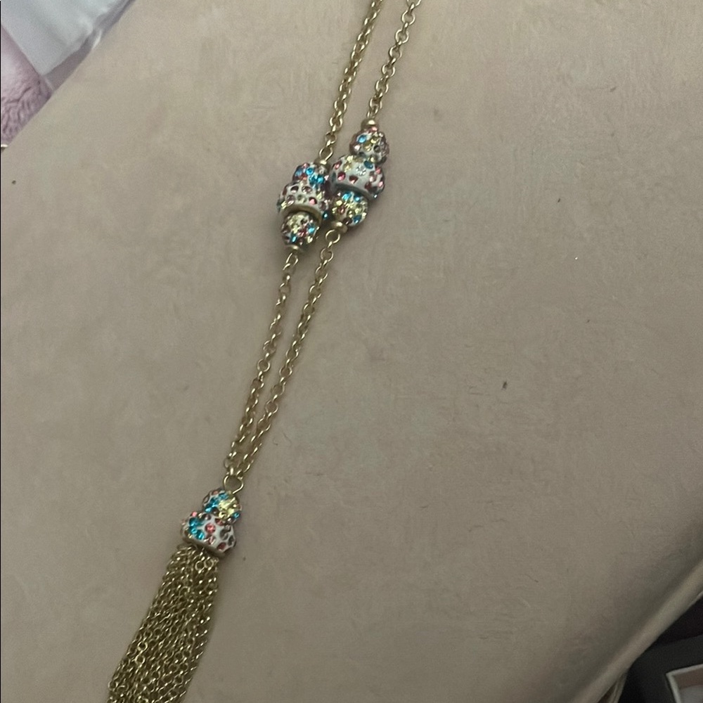 Gold Necklace with Turquoise Accents and Elegant Tassel